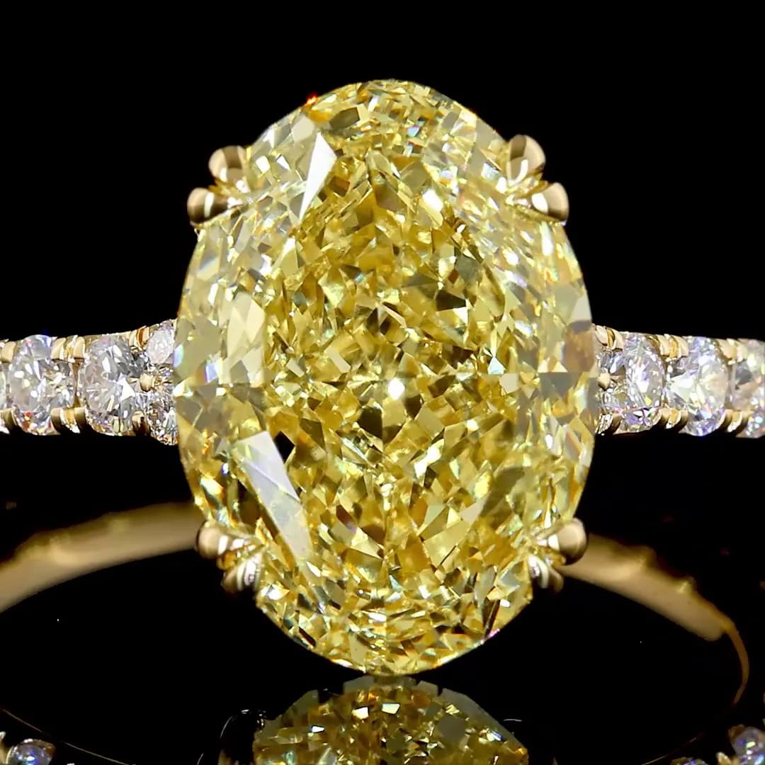 Fancy Yellow Oval Diamond Solitaire Ring with Pavé Band